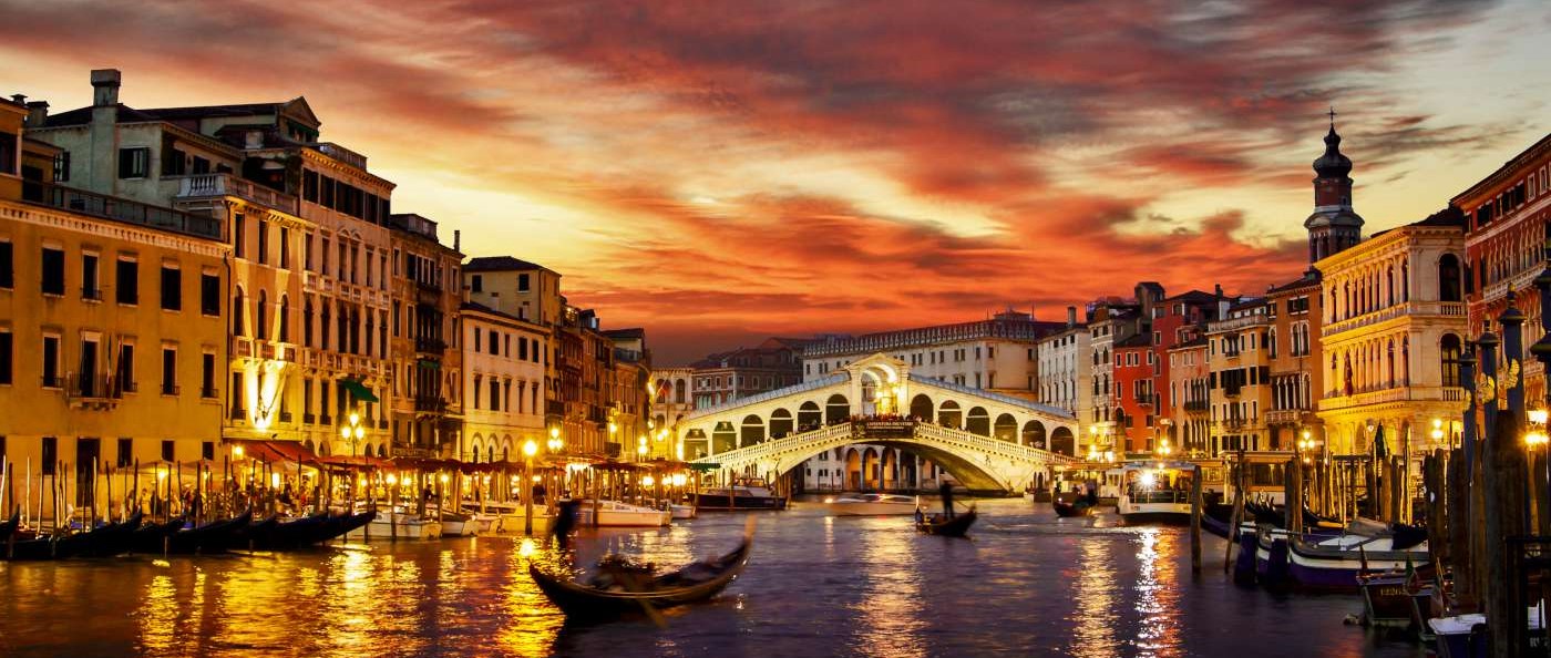 Ponte Rialto and gondola at sunset in Venice Italy 14002